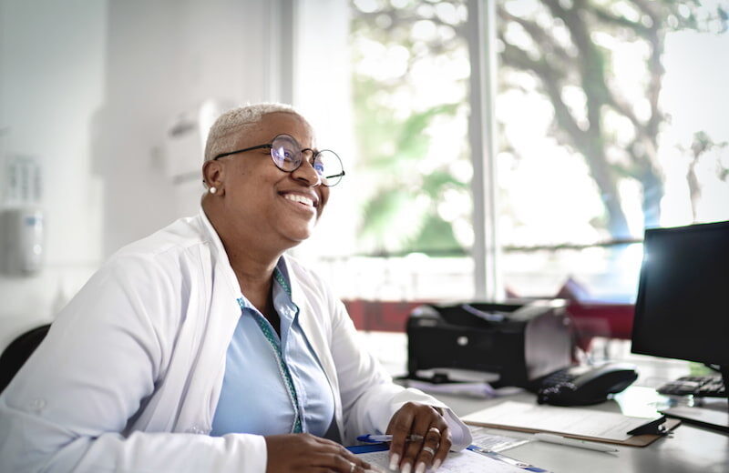 woman wearing glasses while at work