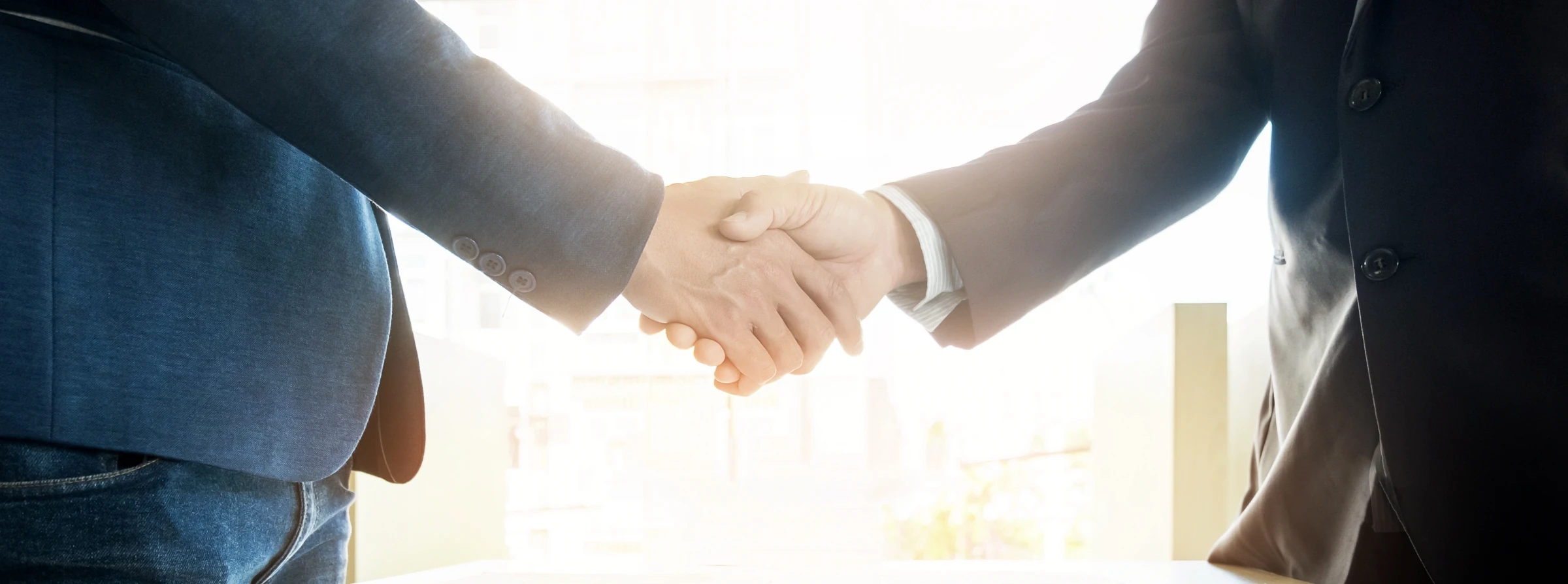 two people shaking hands